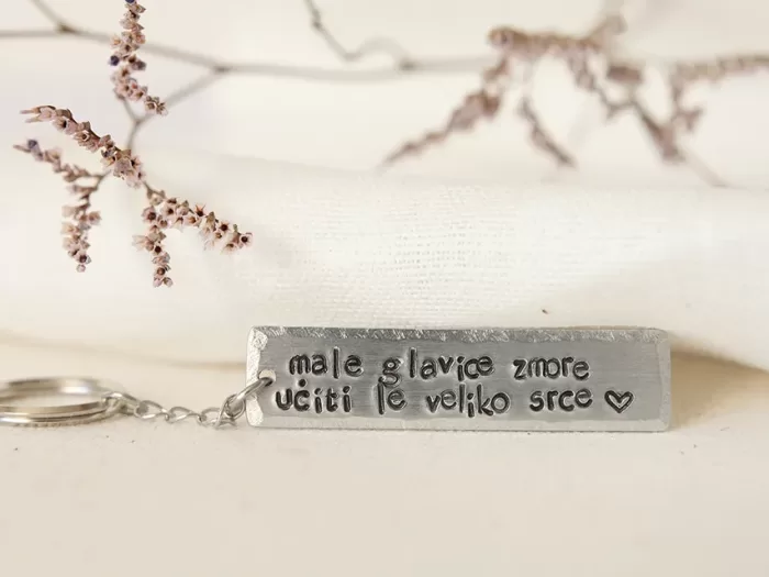 Obesek za ključe Male glavice zmore učiti le veliko srce